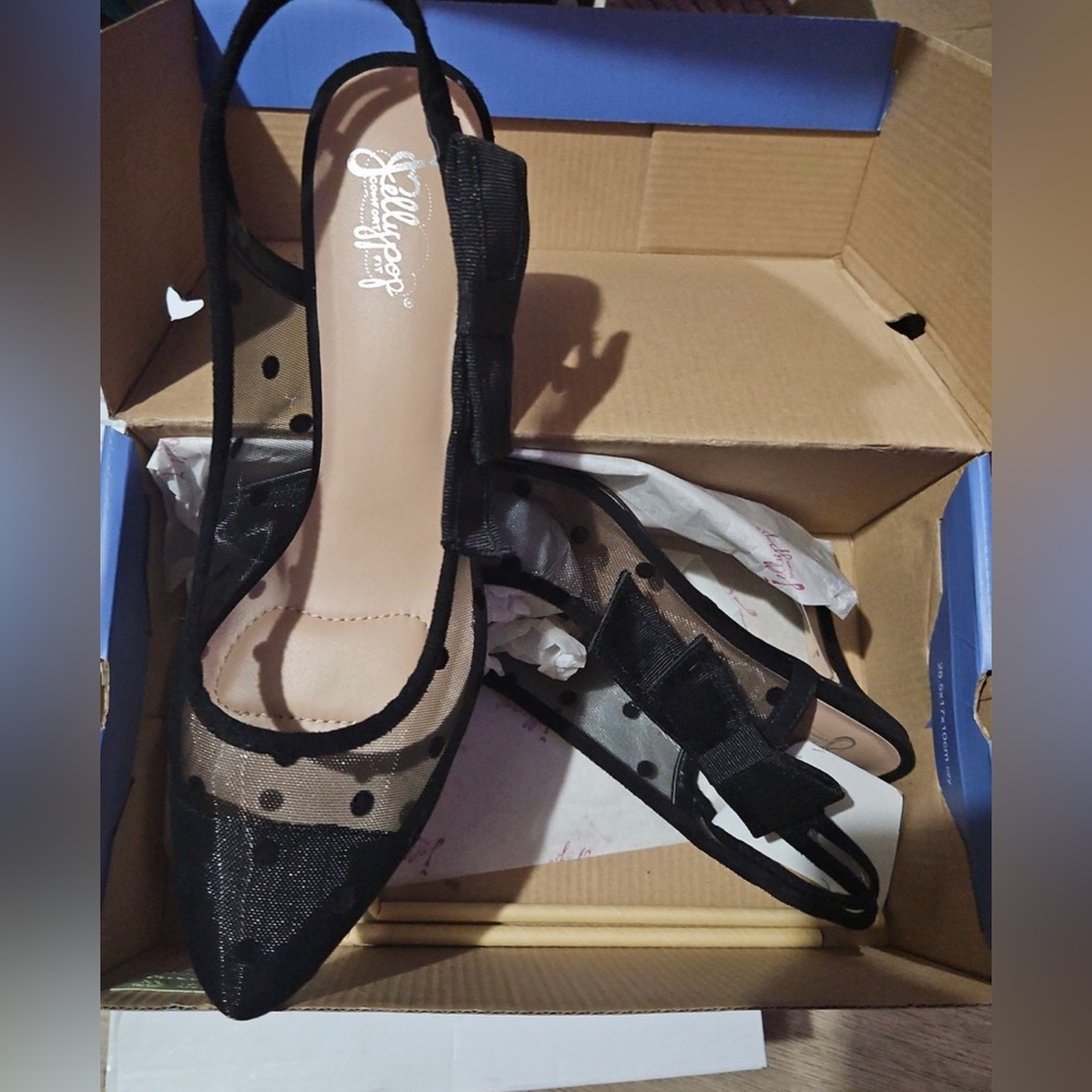 Black heels with polka dots